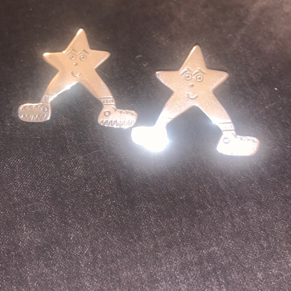 Sterling silver pickle ball stars earrings.
